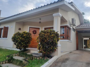 Hospedagem Sil e Jean quarto triplo, cozinha compartilhada com outros hóspedes